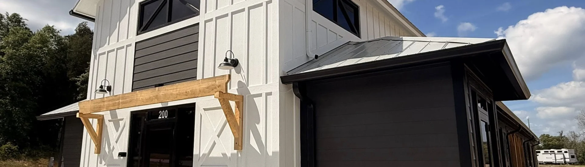front of the clubhouse at Unhitched North Pensacola RV Park in Pensacola, Florida